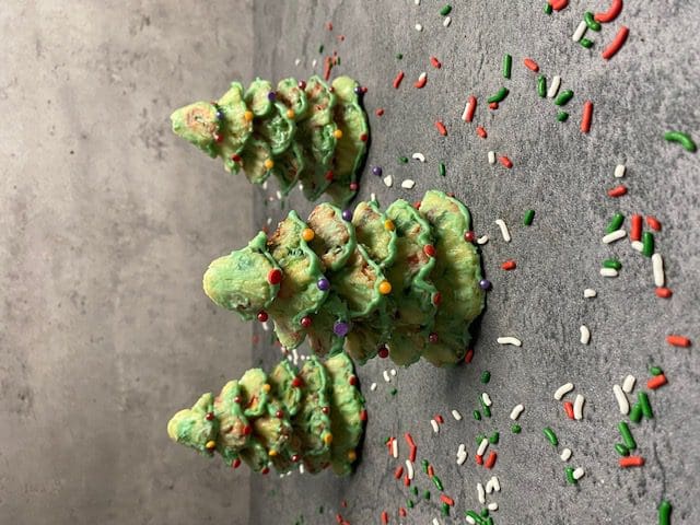 Miniature baked Christmas trees with sprinkles