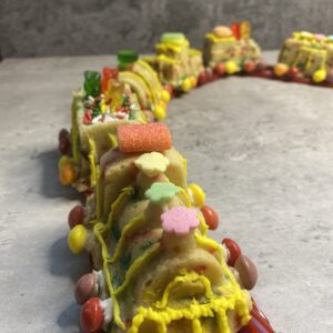 A Train Shaped Cookie With Candy Decoration Copy