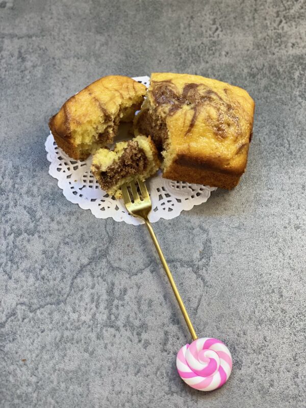 A banana cake and a gold fork