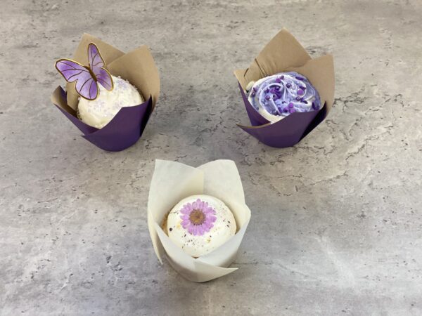 Three Cupcakes With Purple Holders Copy