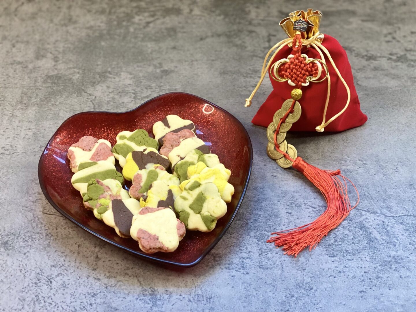 Flower-shaped cookies on a heart-shaped plate