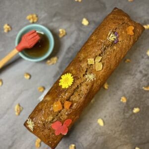 A banana cake with flowers