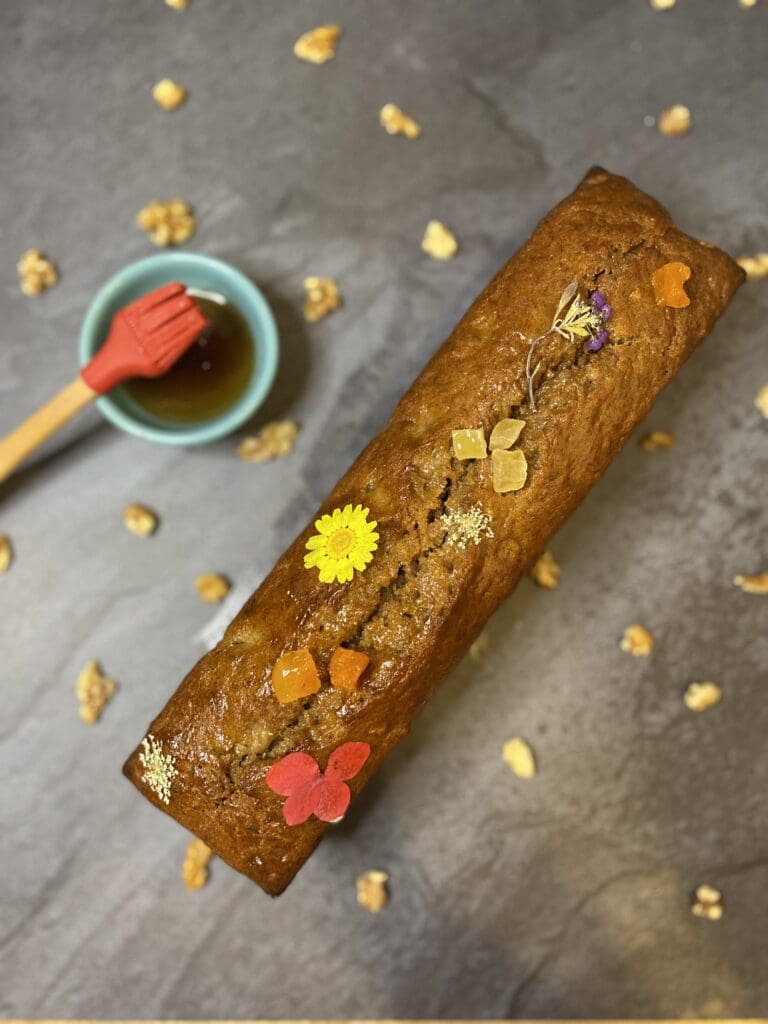 A banana cake with flowers