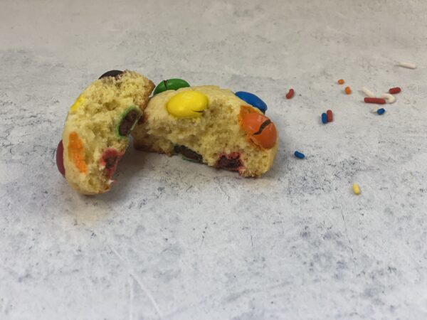 A Broken Cookie With M and M Cookies