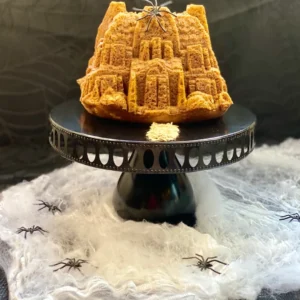 A spider castle-themed cake