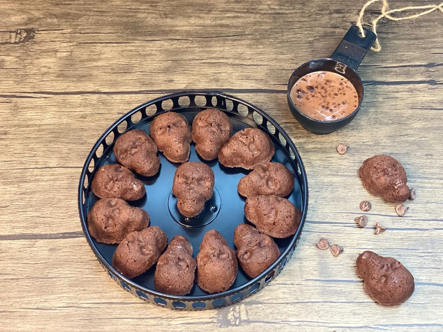 Skull Shaped cookies in a Black Tray